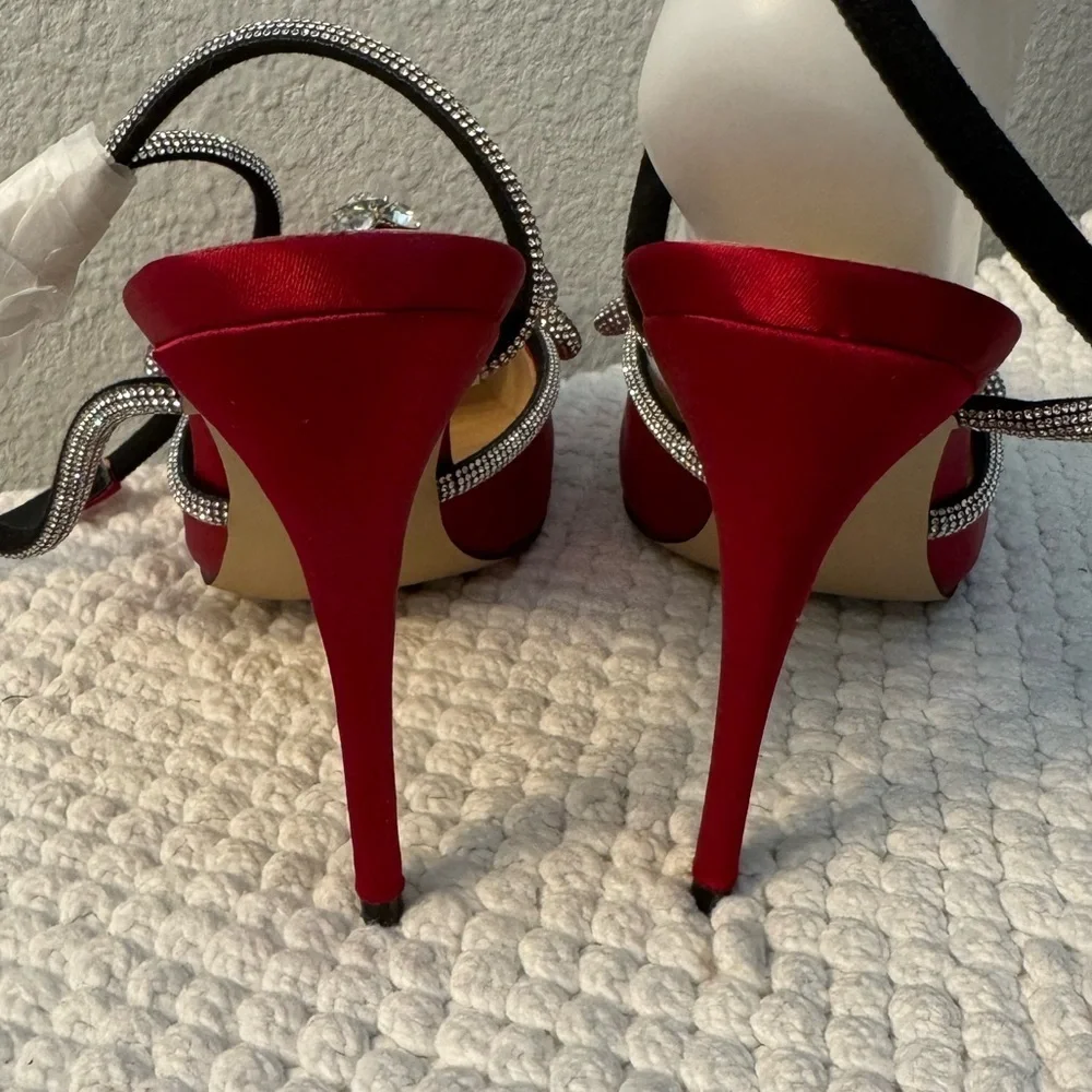 Elegant Red Stiletto Heels with Rhinestone Bow Accents